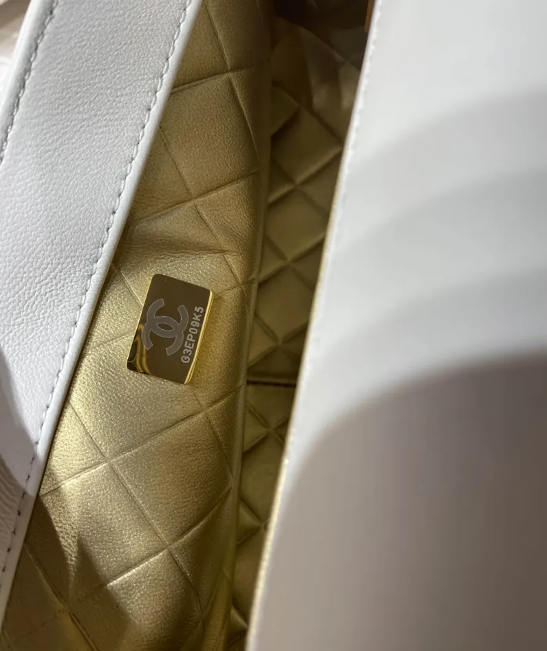 Gold leather rhombus bag Size: 11x19x8cm