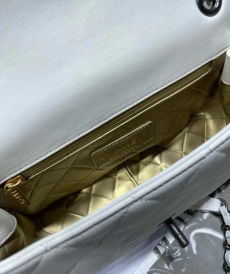 Gold leather rhombus bag Size: 11x19x8cm