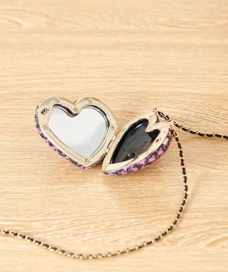 Embroidered peach heart fabric and leather
