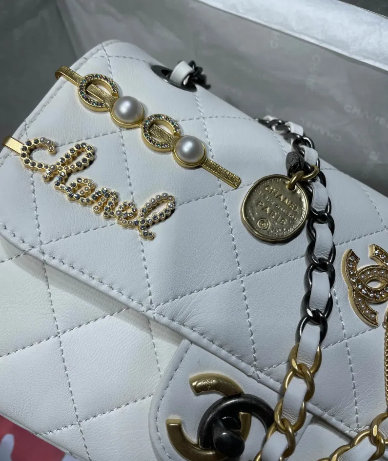 Gold leather rhombus bag Size: 11x19x8cm