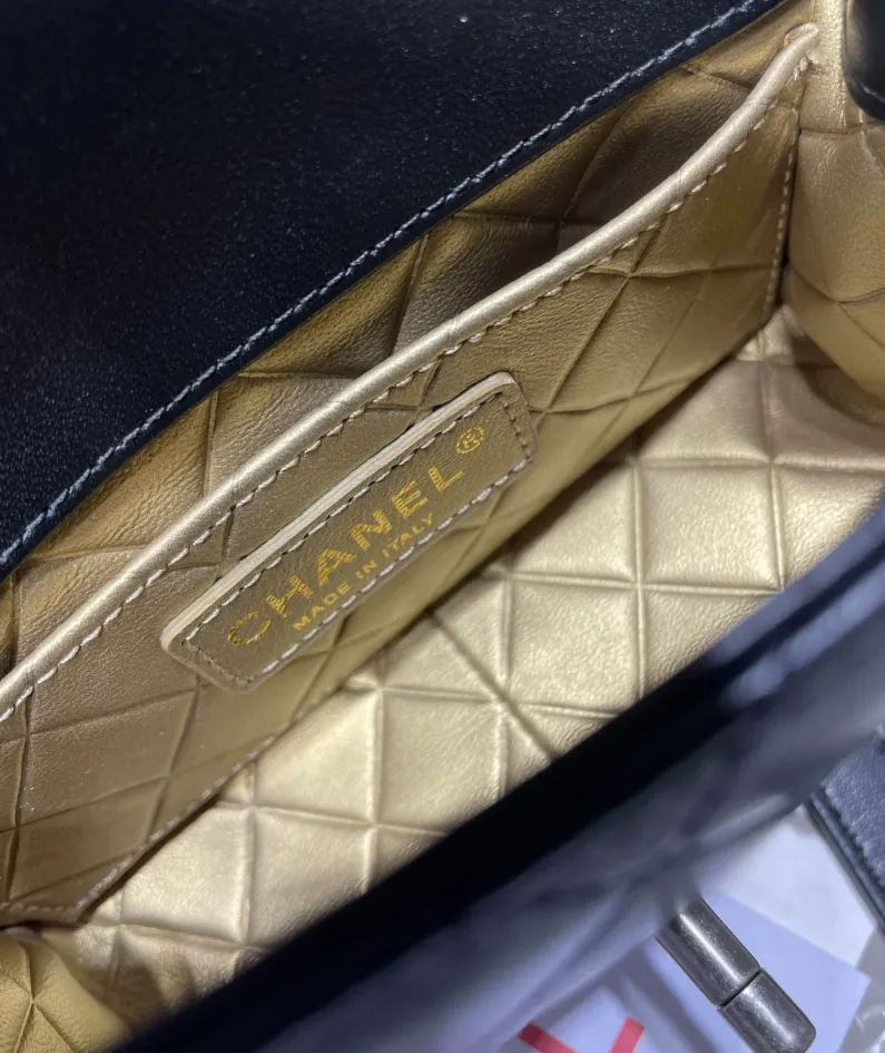 Gold leather rhombus bag Size: 11x19x8cm