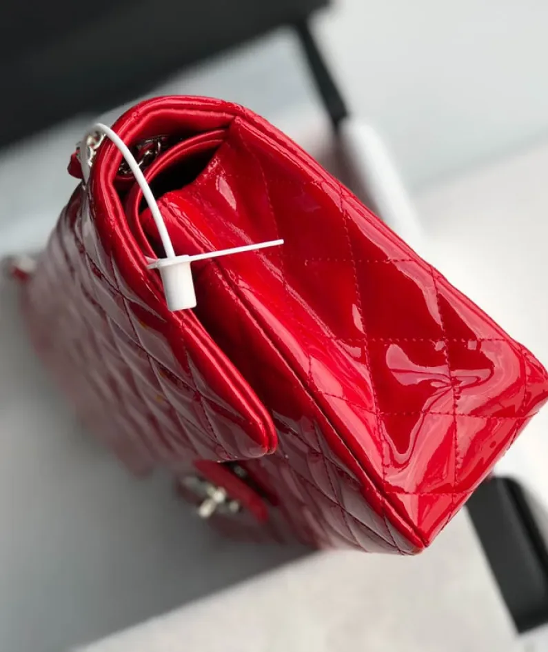 Chanel patent leather pouch size:25.5cm Ident No.: 1112