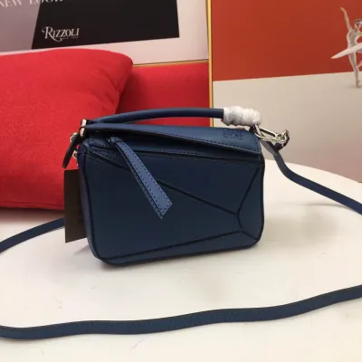 Calfskin Size: 18*12.5*8cm Model: 0150