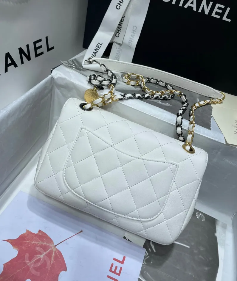 Gold leather rhombus bag Size: 11x19x8cm