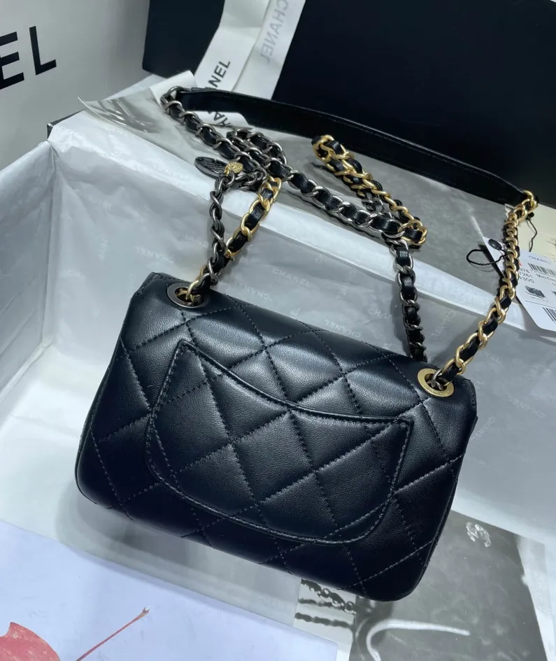 Gold leather rhombus bag Size: 11x19x8cm