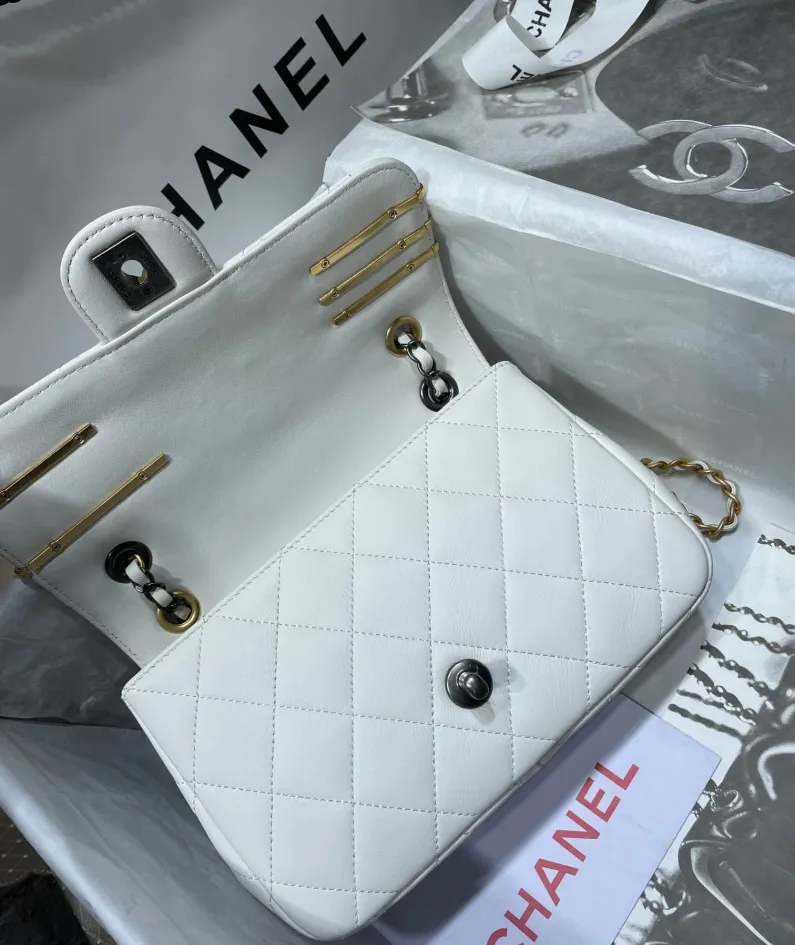 Gold leather rhombus bag Size: 11x19x8cm